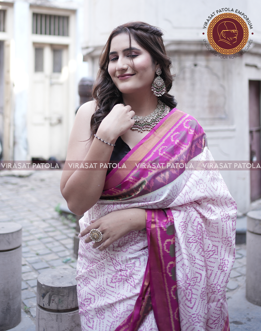 White pink bandhani patola saree