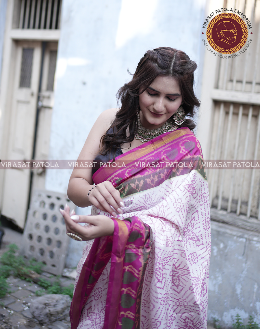White pink bandhani patola saree