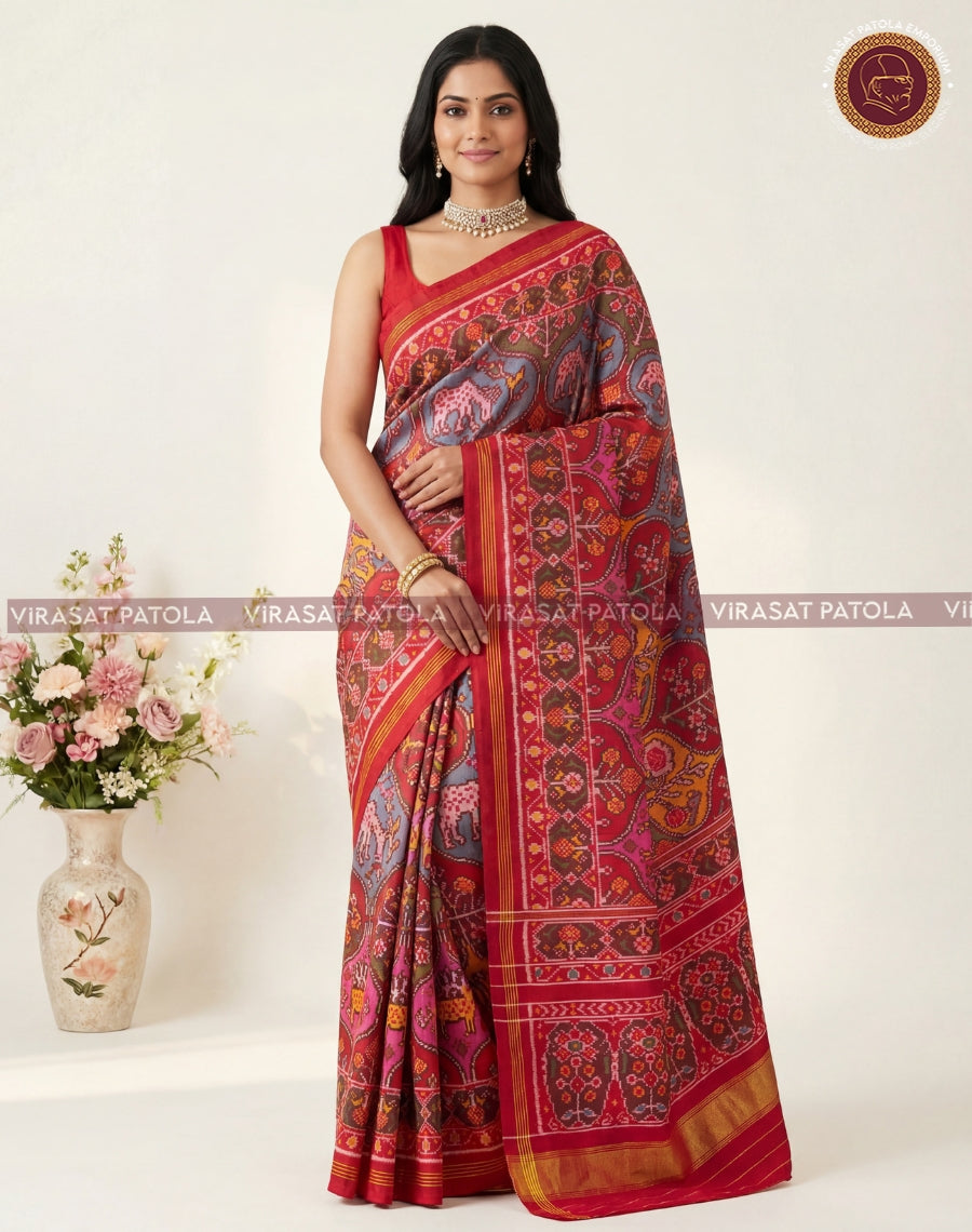 Multicolour traditional patola saree with red pallu, dark blue body and gold border