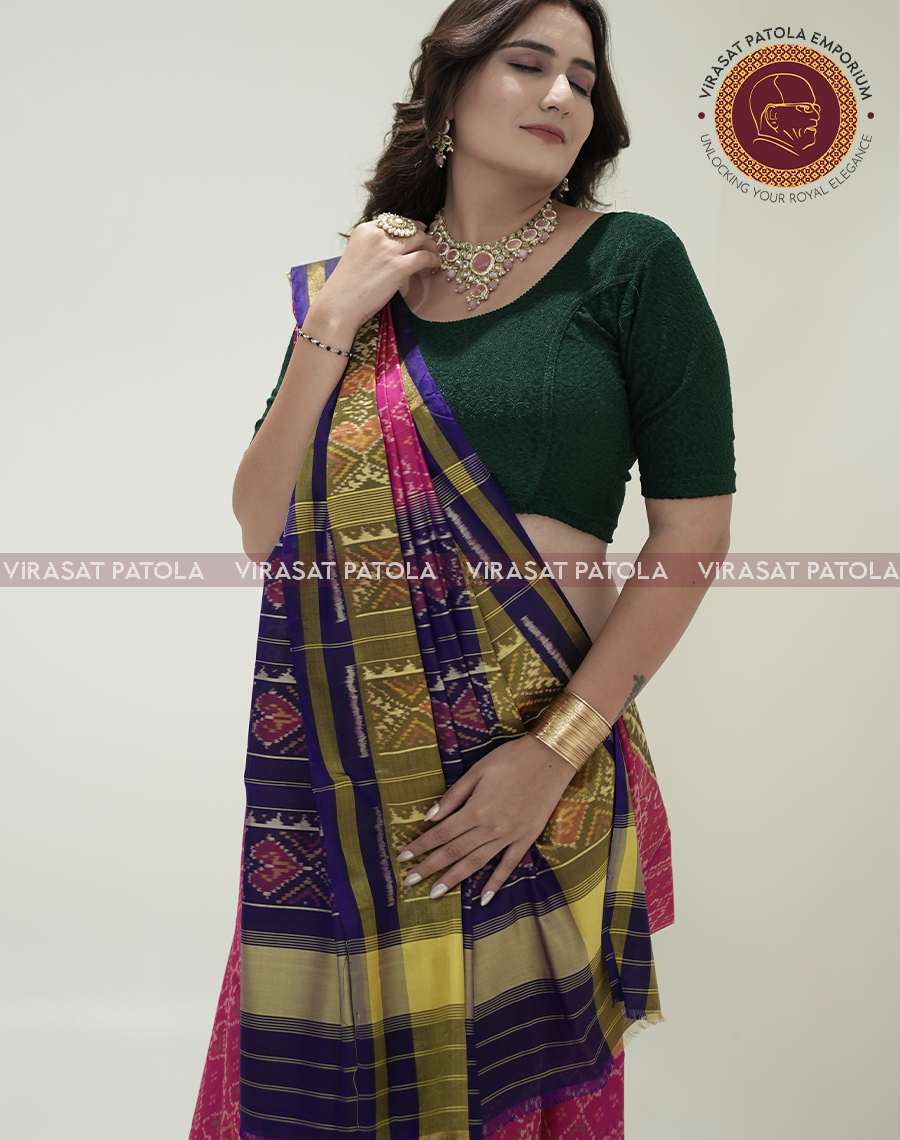 Draped Pink Manekchowk Patola saree with purple stripes and gold woven border