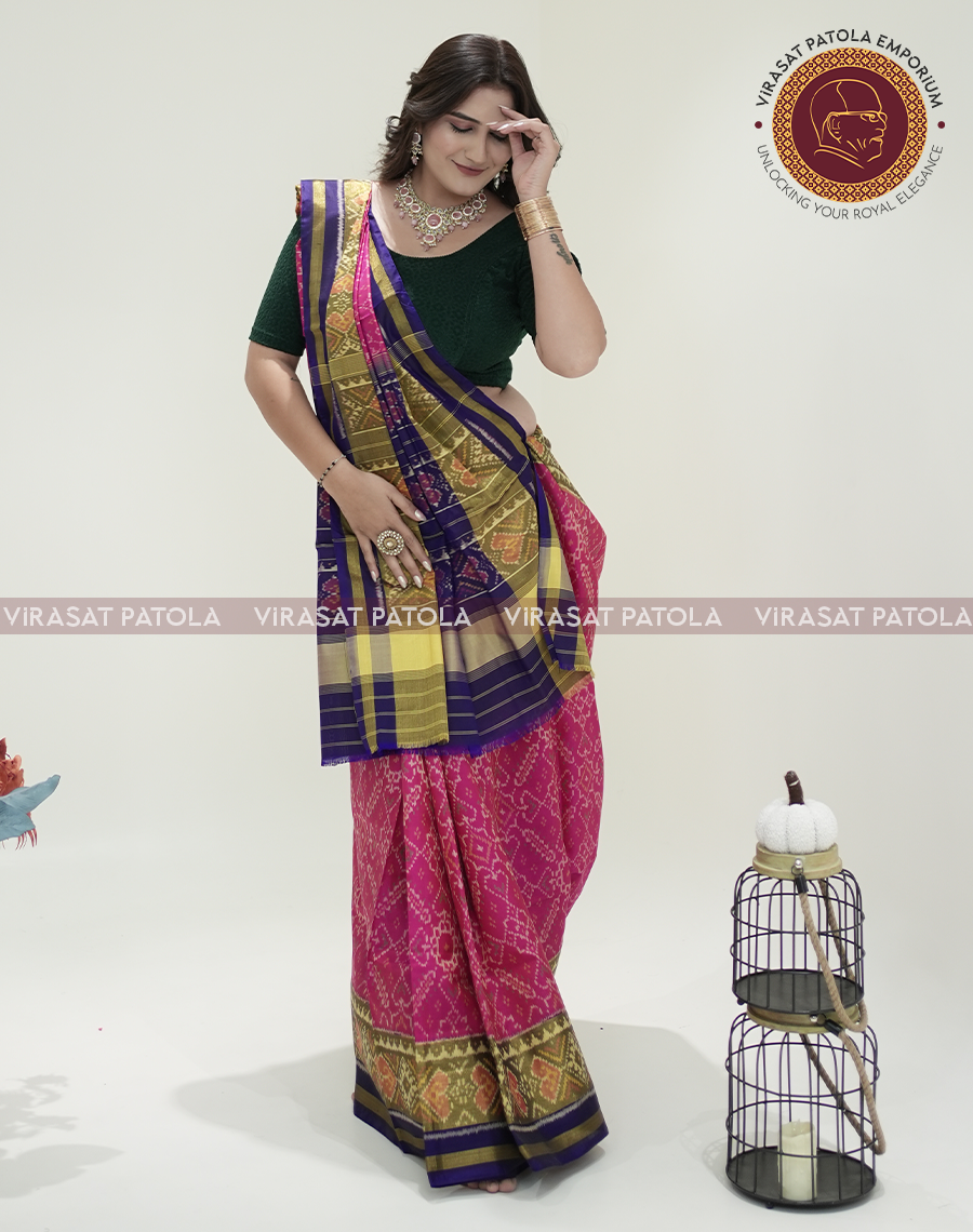 Pink Manekchowk Patola saree with wide purple-gold stripes and pink border