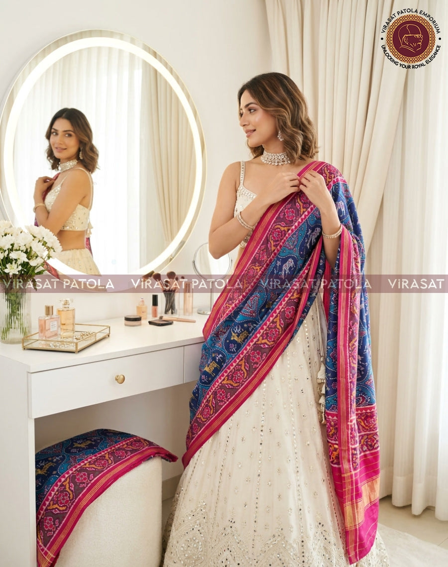 Blue patola dupatta with animal and floral motif, pink border, long drape