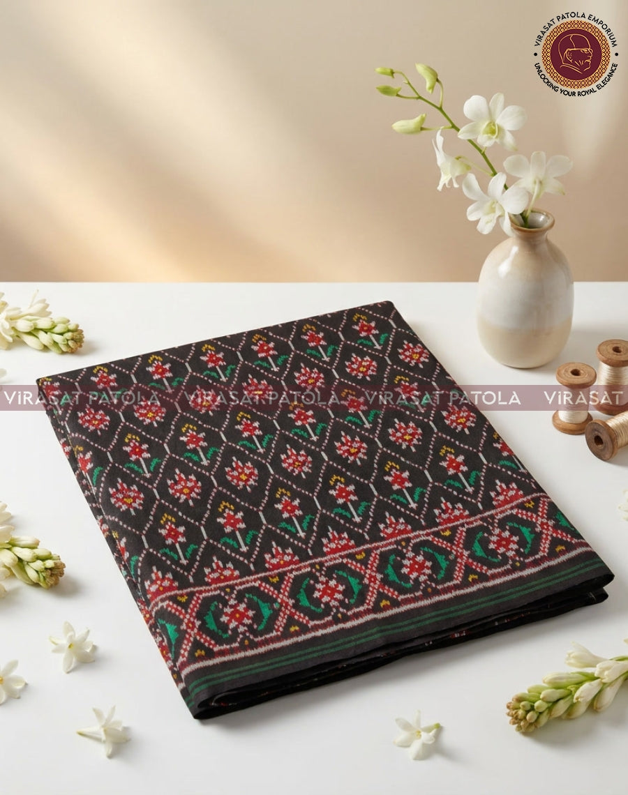 Patola blouse fabric piece in black with multicolor floral geometric motifs