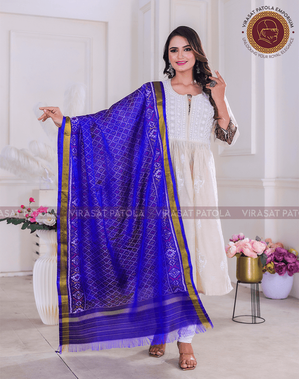 Blue patola bandhani dupatta with diamond grid pattern and gold border, draped