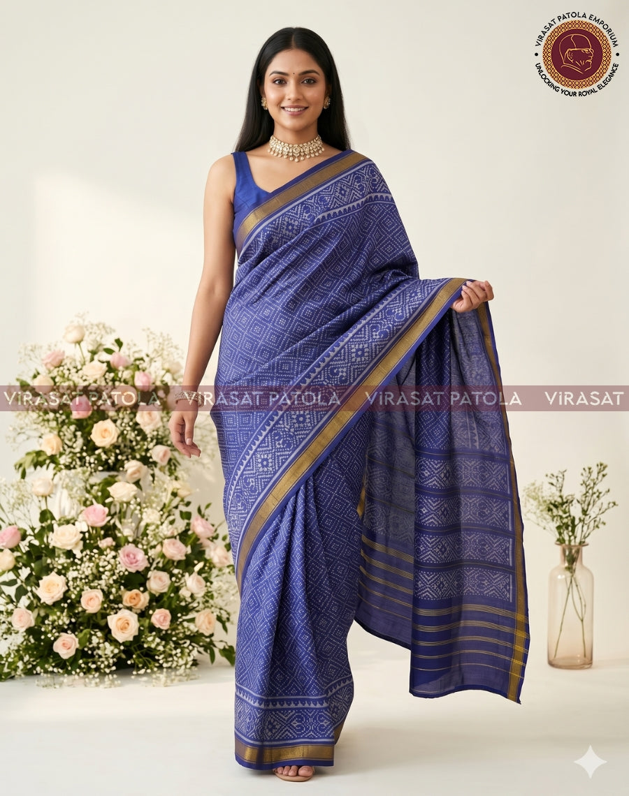 Blue saree pallu with gold-trim border, diamond pattern, and striped gold edge