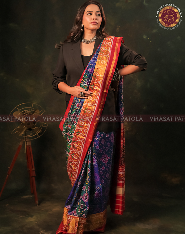 Blue patola saree with multicolor woven border and red-gold pallu