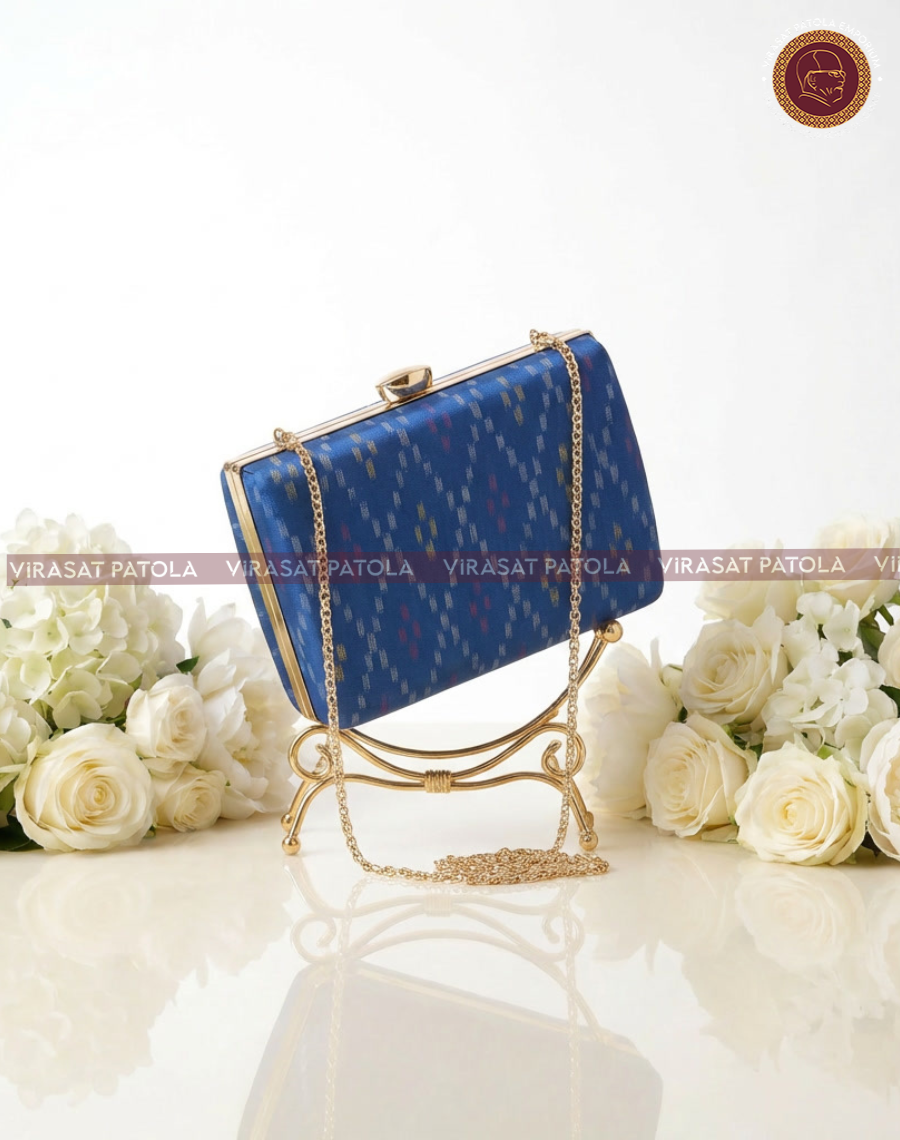 Blue patola bandhani clutch, rectangular with gold chain shoulder strap