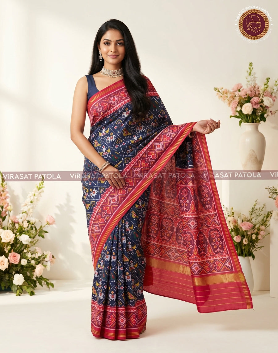 Dark blue and maroon Patola saree, wide red border with gold trim