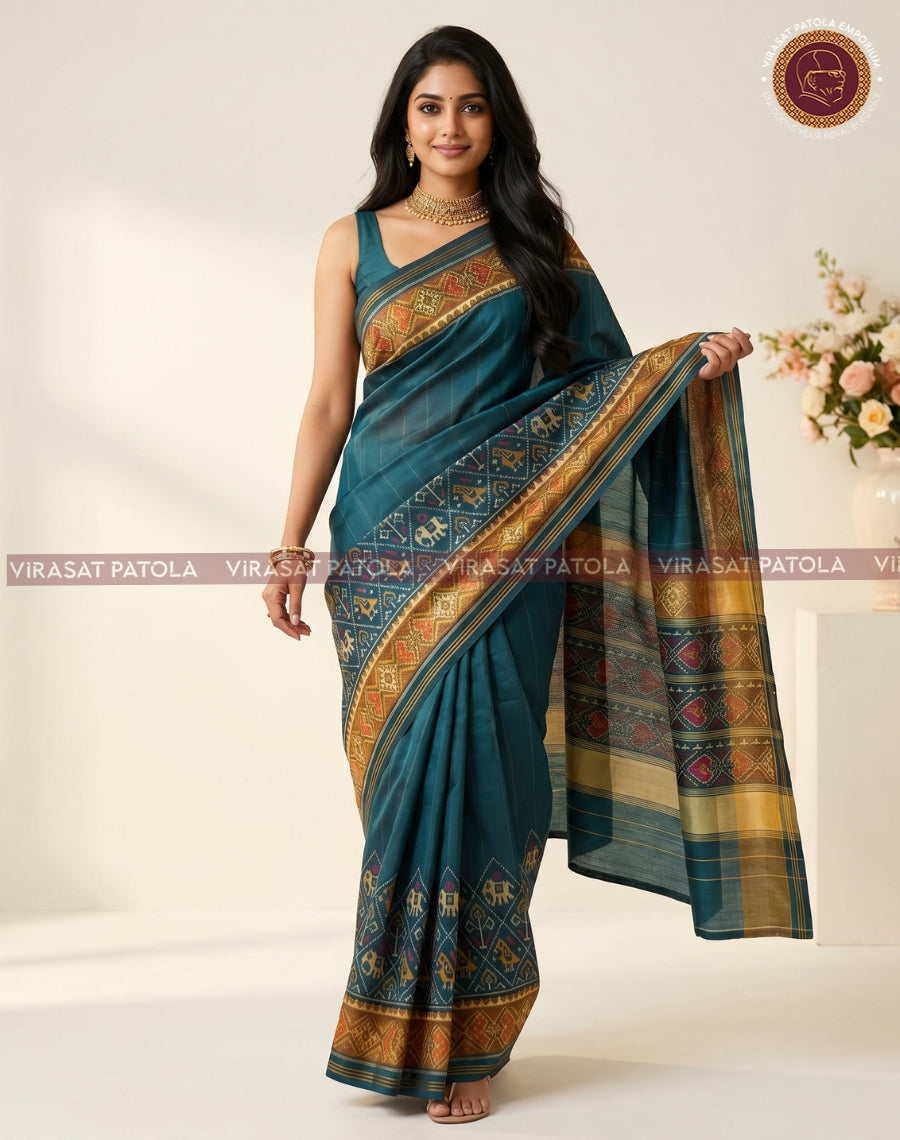 Dark green traditional patola saree with blue-brown border and patterned pallu