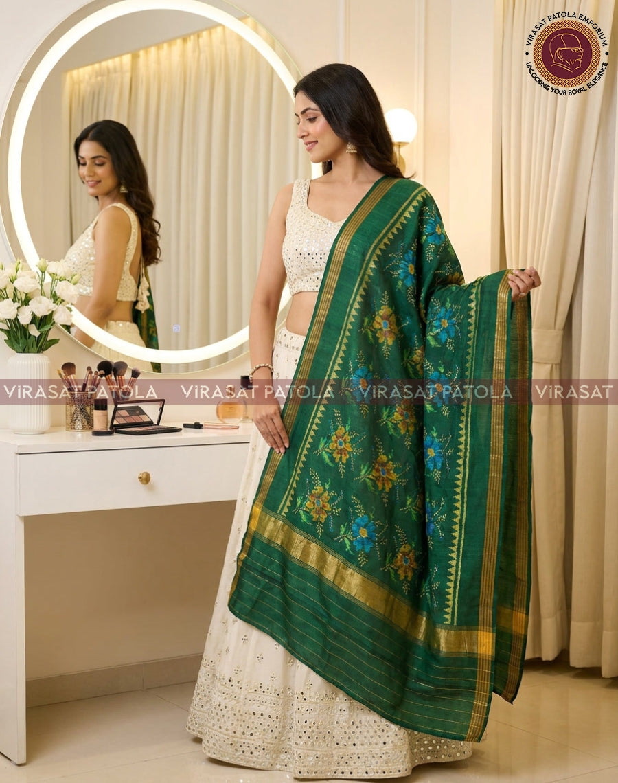 Green floral silk dupatta with gold border, held by model on side
