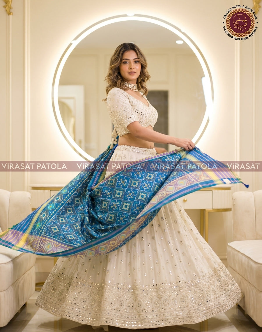 Pastel blue panchanda patola dupatta with geometric border and blue-gold trim