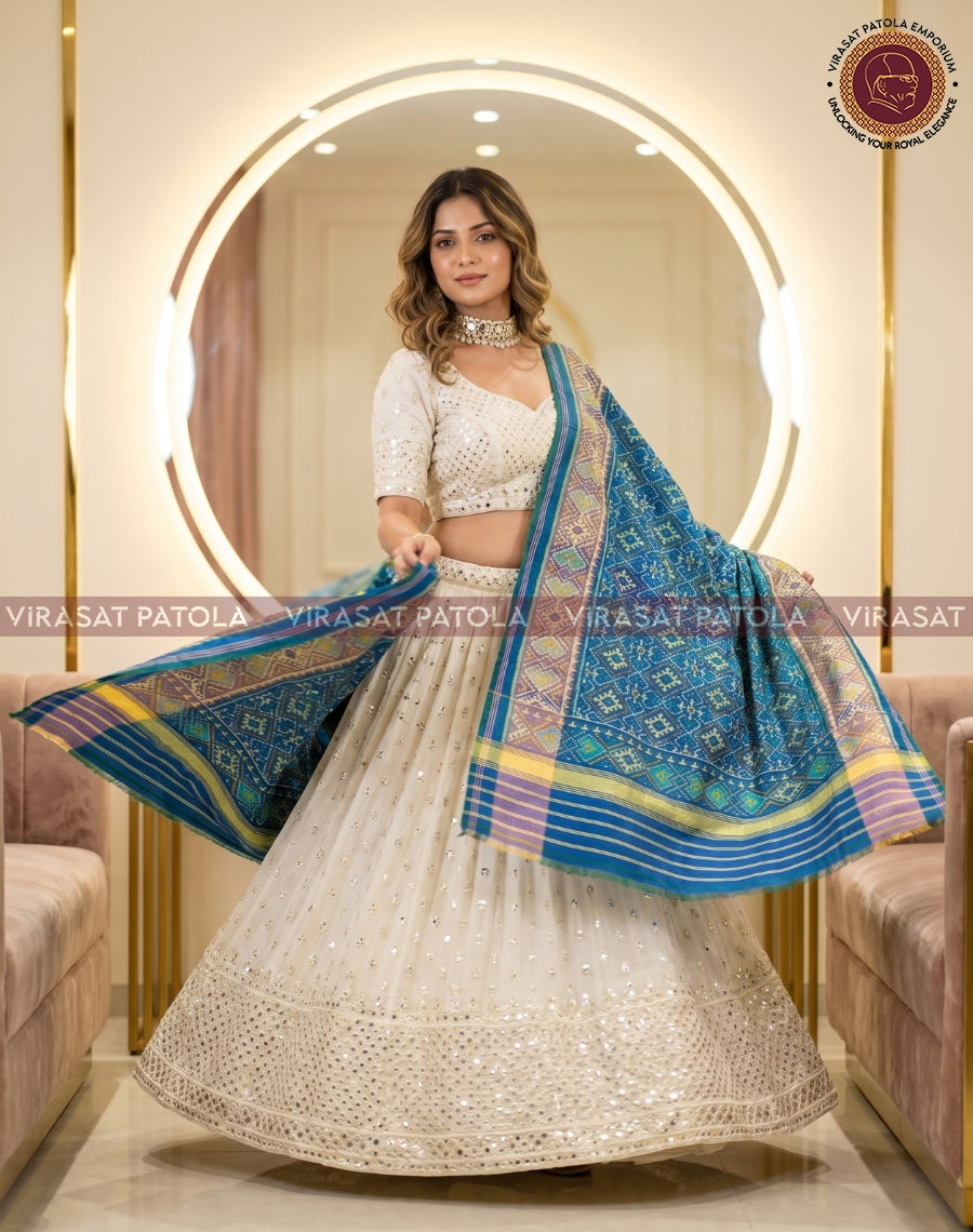 Pastel blue panchanda patola dupatta with wide geometric panel and multicolor border
