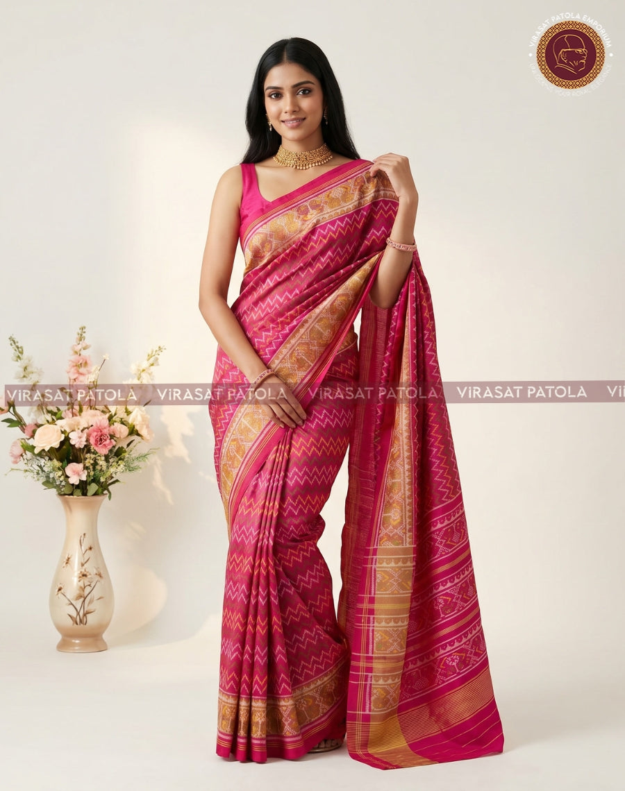 Pink saree with laheriya zigzag weave, ornate pallu with golden zari stripes