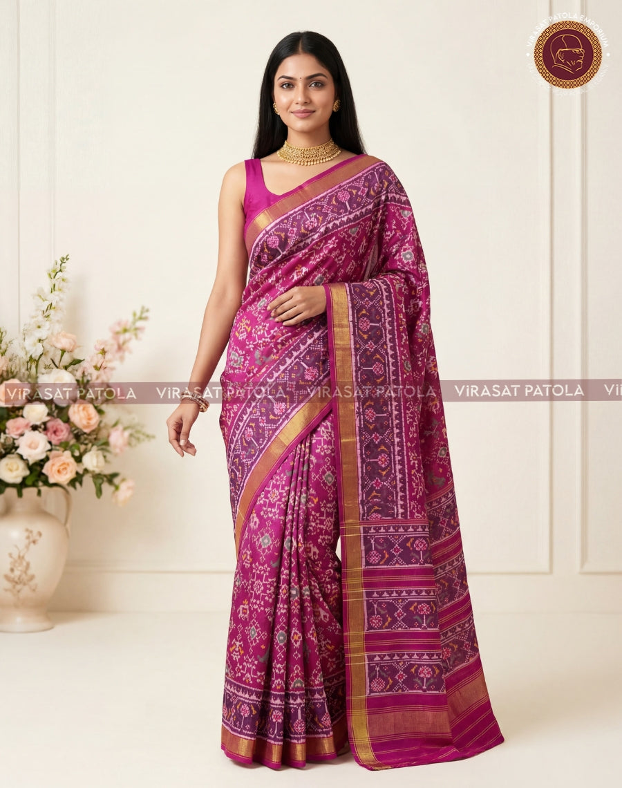 Pink Narikunjar patola saree with dark magenta design blocks and gold zari border