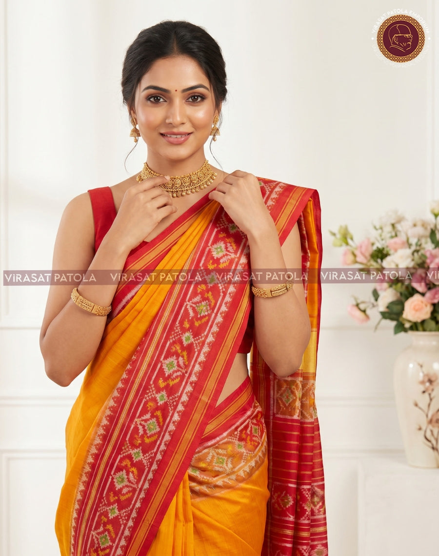 Plain yellow saree showing blouse-ready neckline; red patterned pallu and wide border