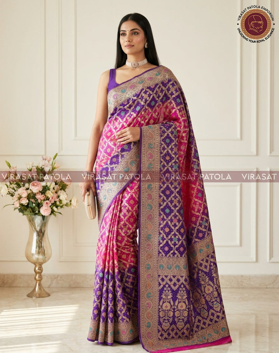 Georgette bandhani saree with purple and pink panels and wide gold-toned border on model
