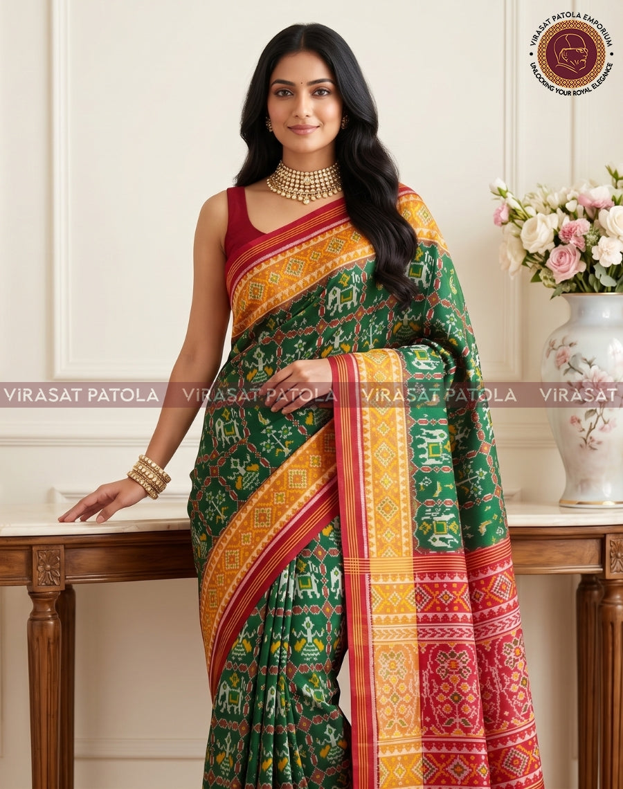 Green traditional patola saree drape with multicolor geometric bands and maroon border