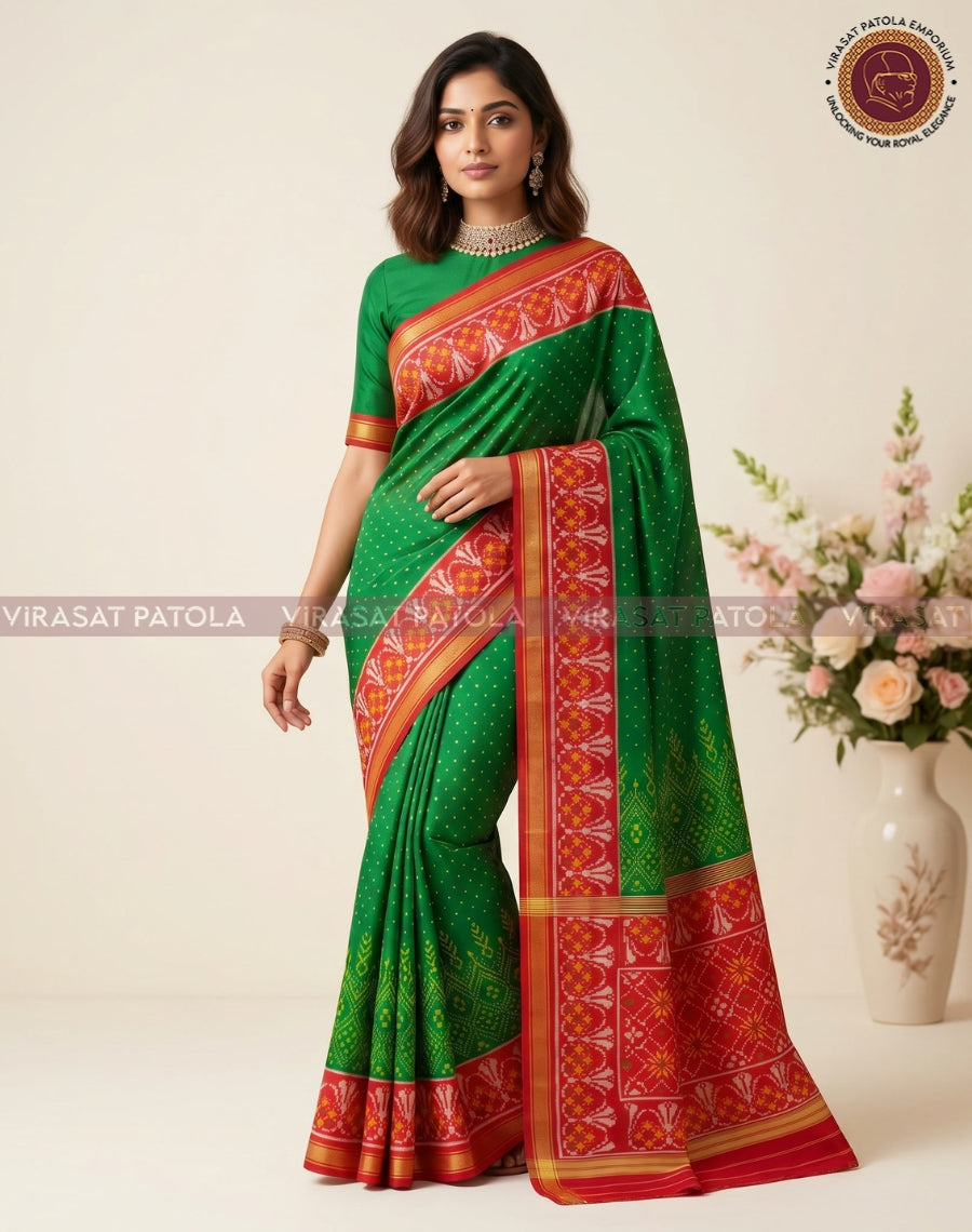 Green traditional patola saree with red-gold border and patterned pallu