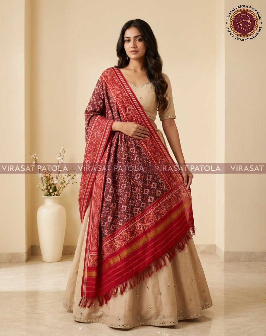 Maroon red Patola dupatta with geometric motifs and gold striped border, fringed ends