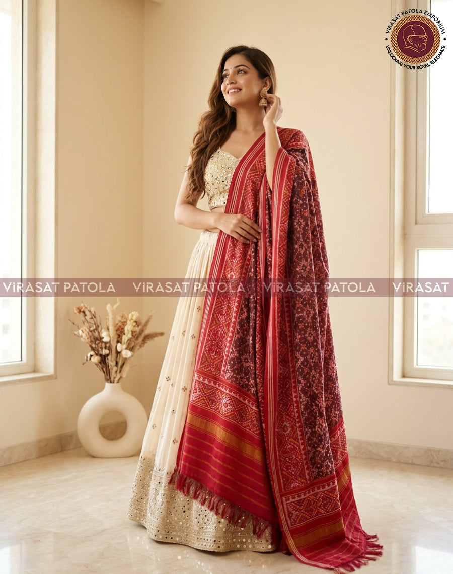 Maroon red dupatta with intricate geometric pattern and gold border stripes, tassel fringe