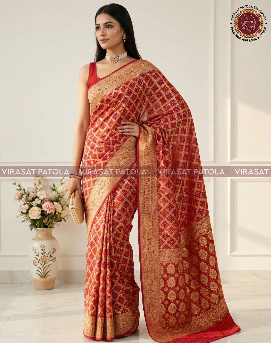 Red bandhani georgette saree with gold pallu border and patterned body, full-length.