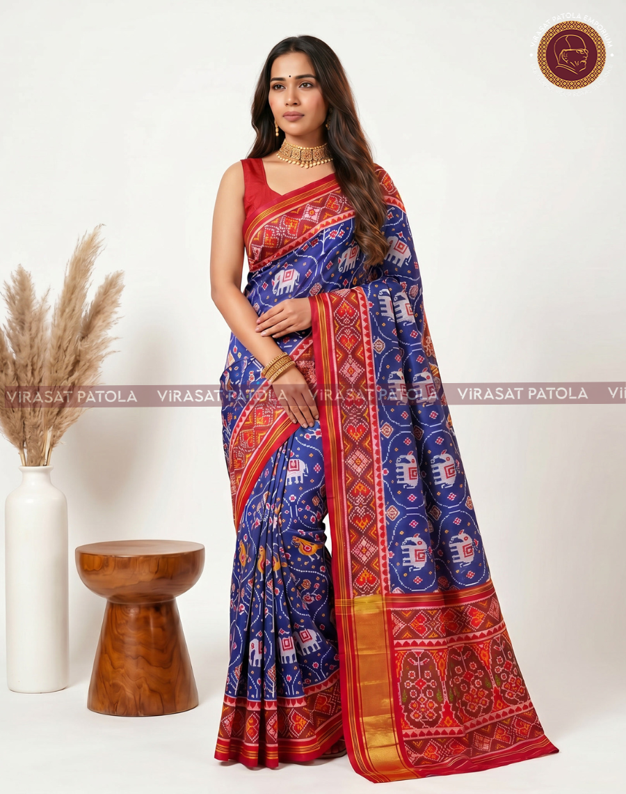 Blue Nari Kunjar saree with red patterned pallu and gold border