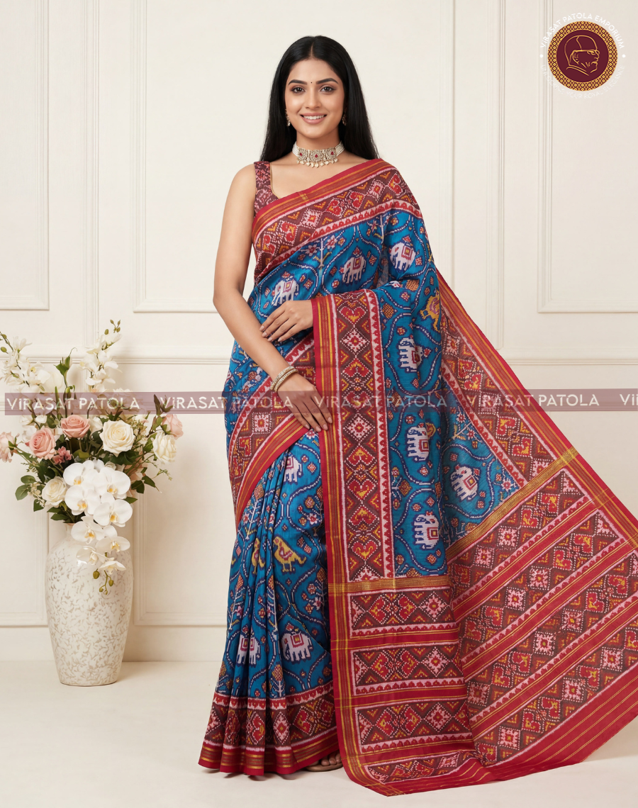 Virasat Patola blue saree with maroon-red borders and patterned pallu