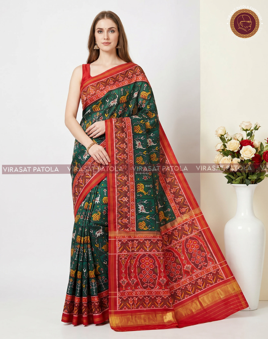Green Shikari patola saree with red geometric panel and gold zari pallu