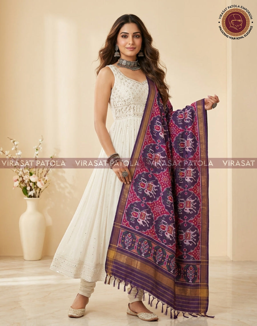Royal blue and magenta patola dupatta with border, tassels, and woven motifs