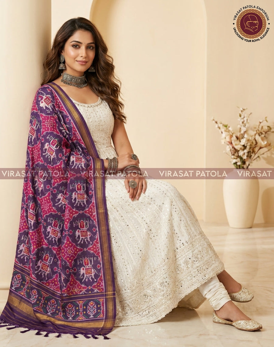 Royal blue and magenta patola dupatta with wide border and tasselled edge