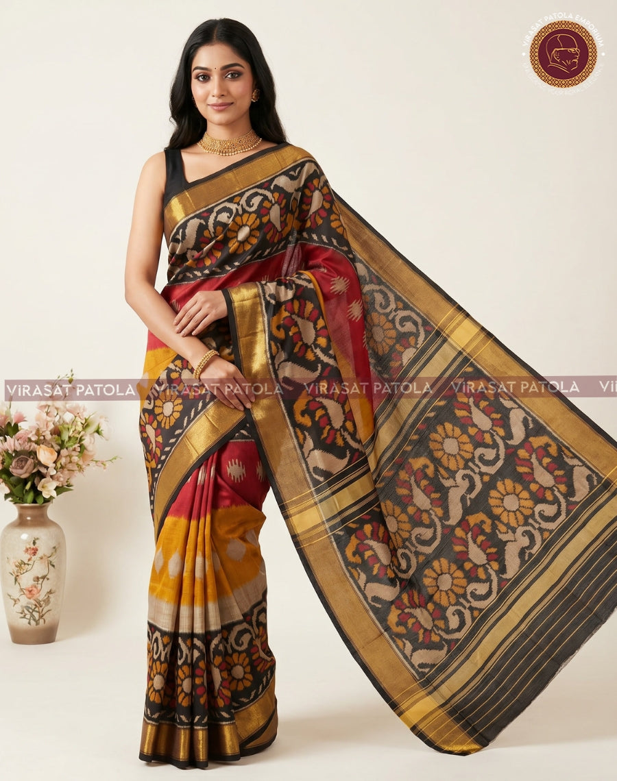 Black Patola pallu with ornate multicolor floral motifs and gold trim