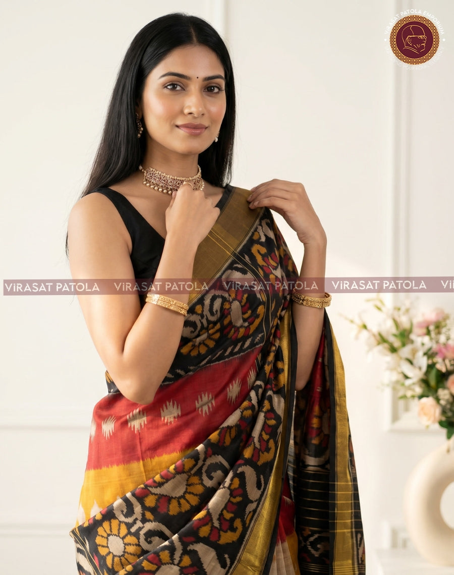 Black Patola saree with gold border, multicolor woven motifs on pallu