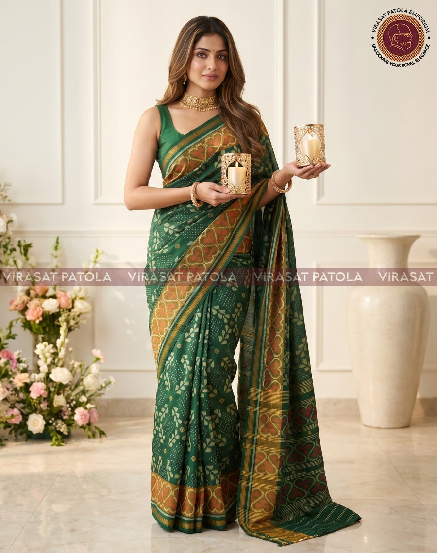 Green patola saree with red and gold border, geometric motif weave