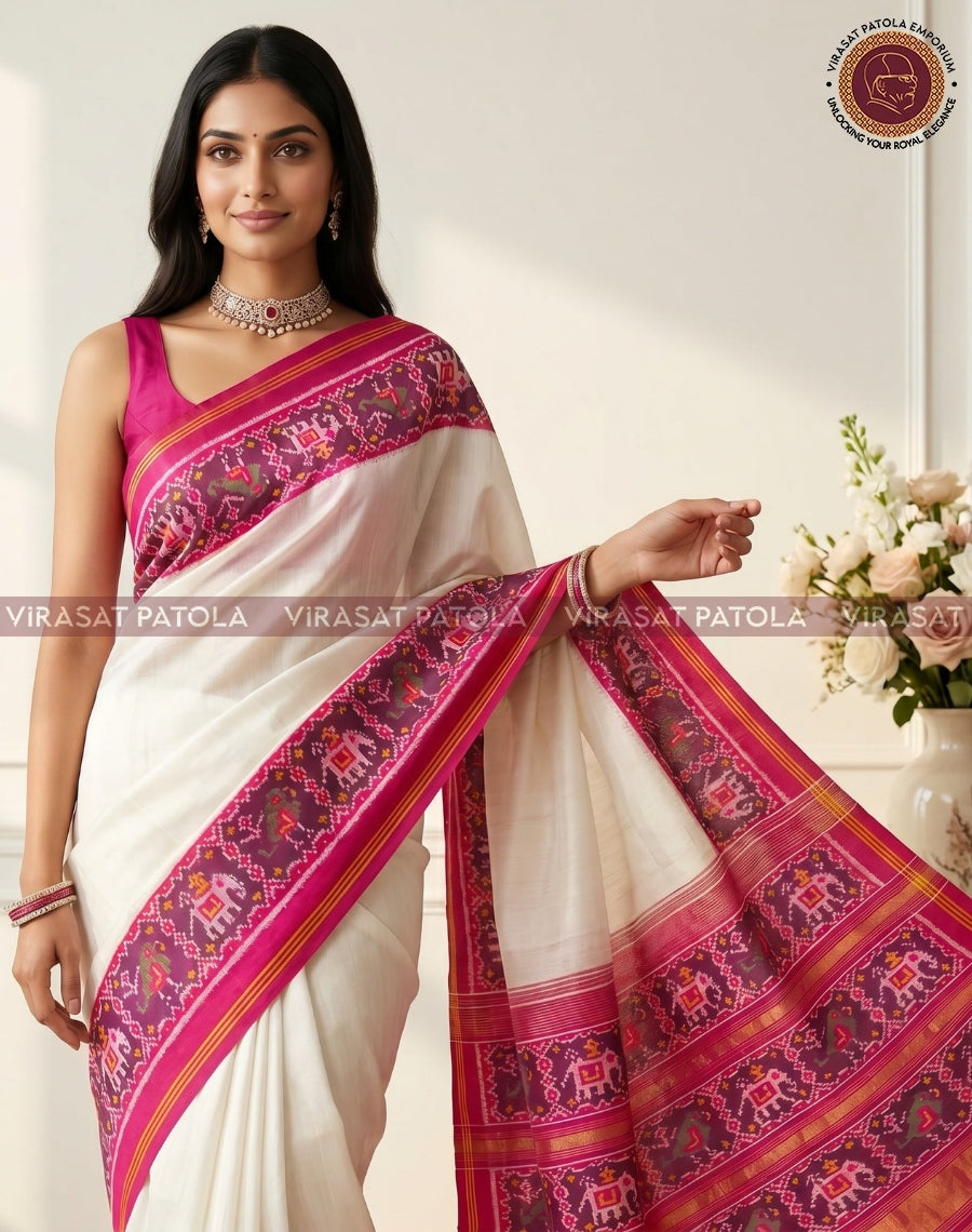White saree with magenta-pink pallu panel and woven-style motif border
