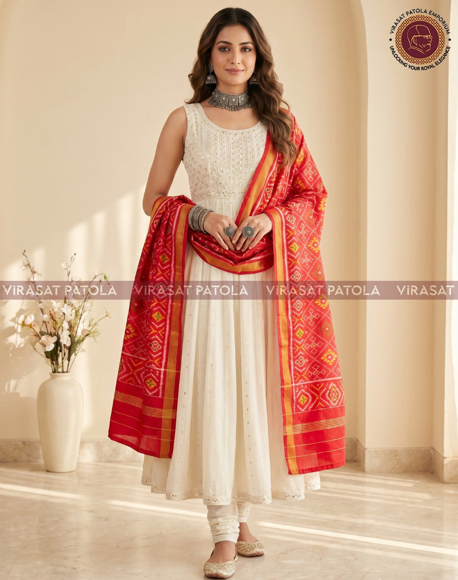 Red patola dupatta with gold-edged border and diamond geometric pattern